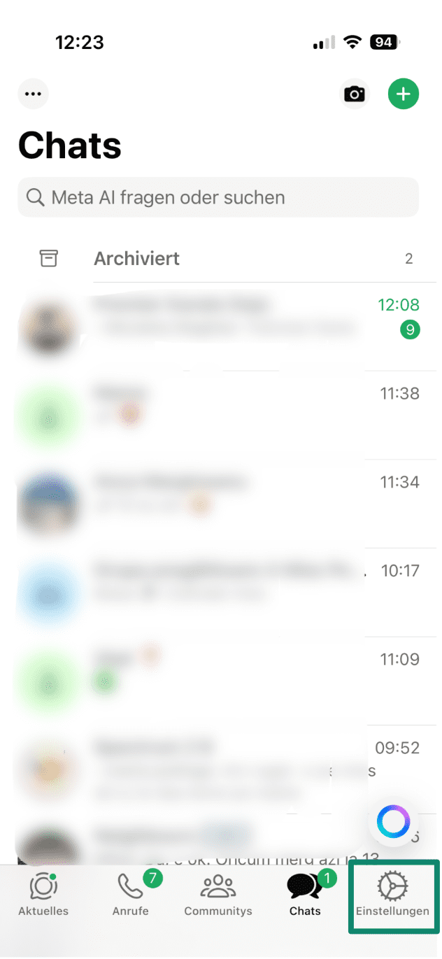 WhatsApp home screen on iPhone with Settings icon highlighted in bottom-right corner