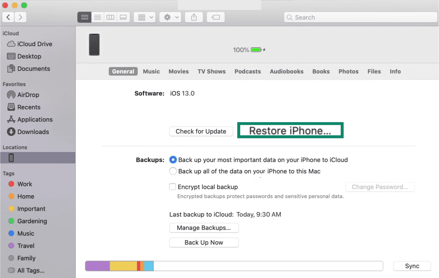 The General tab of an iPhone in Finder, showing the Restore iPhone option.